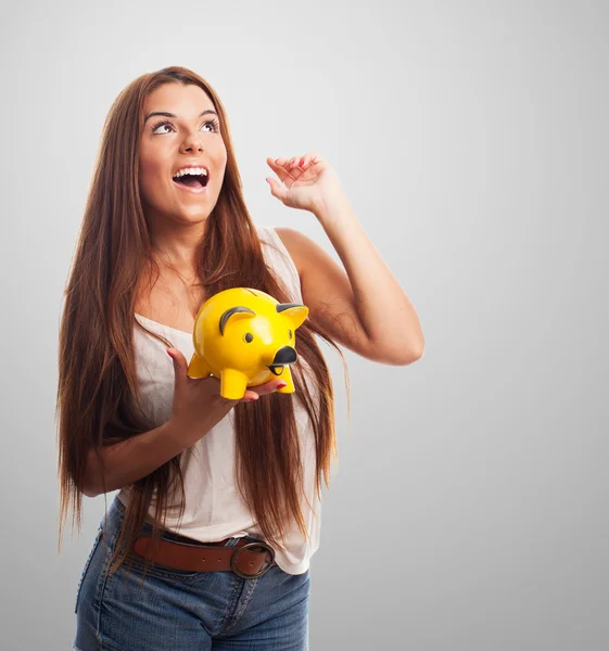 Woman holding a piggy bank — Stock Photo, Image