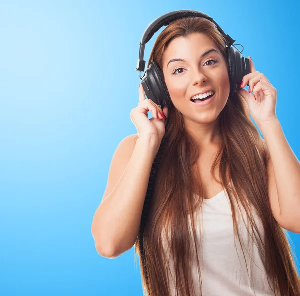 Mujer joven en auriculares —  Fotos de Stock