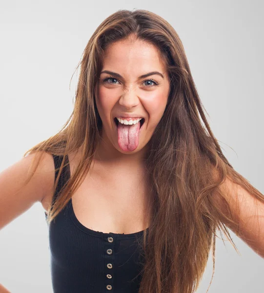 Chica mostrando su lengua — Foto de Stock