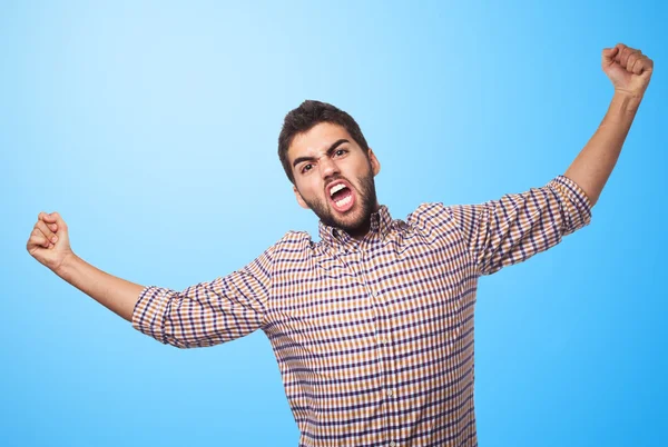 Mann macht Siegesgeste — Stockfoto