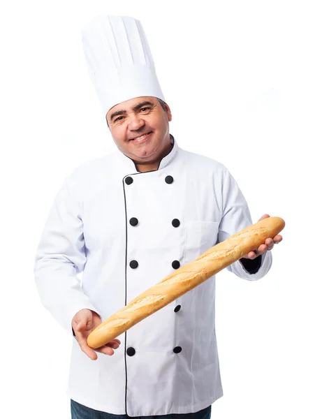 Cook man holding bread — Stock Photo, Image