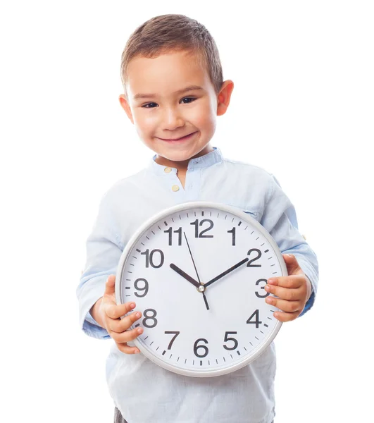 Little boy holding a clock — Stock Photo, Image