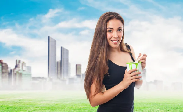 Girl holding a paint can — Stock Photo, Image