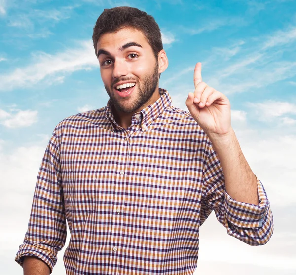 Man pointing up with finger — Stock Photo, Image