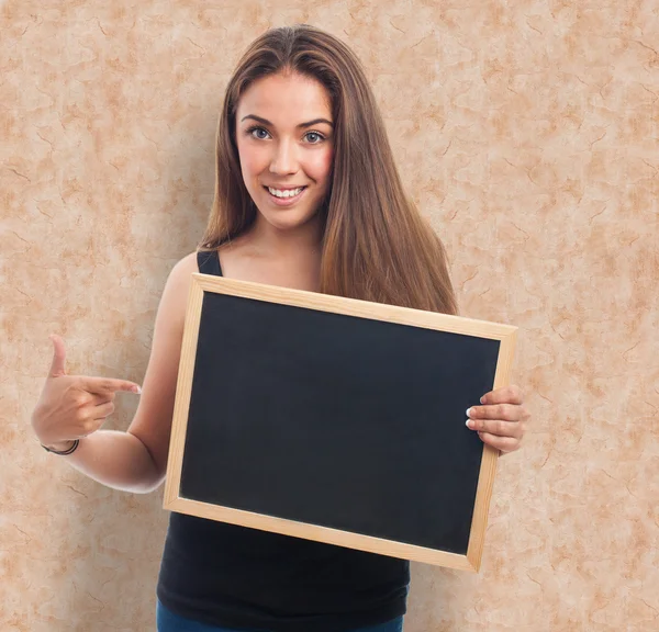 Woman holding a chalkboard — Stock Photo, Image