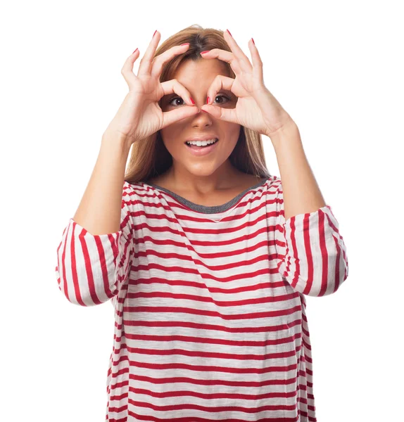 Woman doing a glasses gesture — Stock Photo, Image