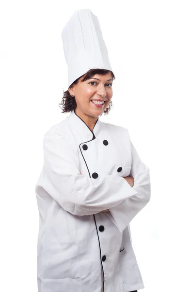 Mature woman ready to cook over white — Stock Photo, Image