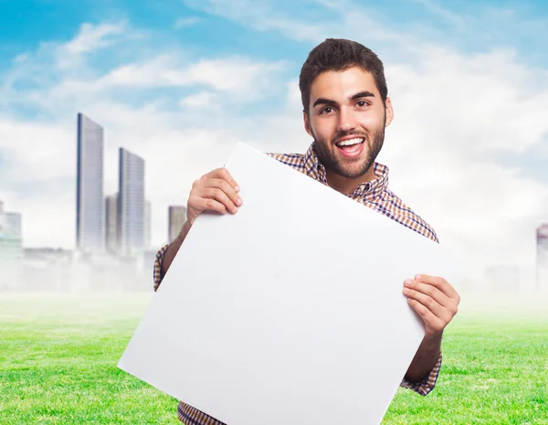 Man holding a banner — Stockfoto