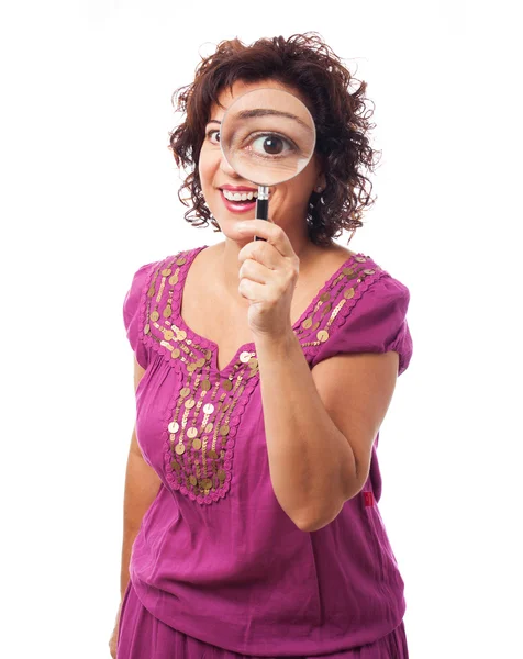 Woman and magnifying glass — Stock Photo, Image