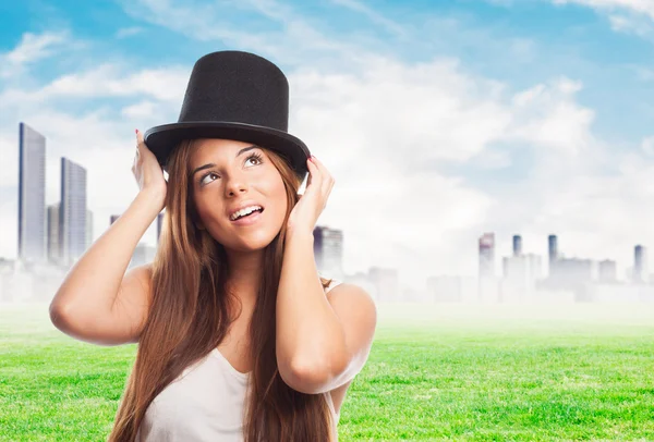 Pretty girl wearing a vintage top-hat — Stock Photo, Image