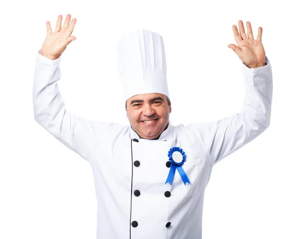 Cook man wearing an insignia — Stock Photo, Image