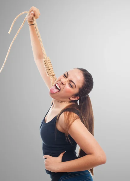 Vrouw opknoping met een touw — Stockfoto
