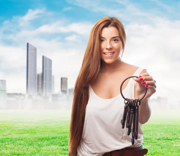 Woman holding a vintage bunch of keys — Stock Photo, Image