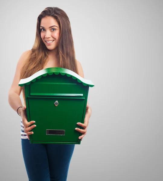 Woman holding a mailbox — Stock Photo, Image