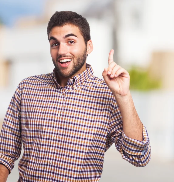 Man pointing up with finger — Stock Photo, Image