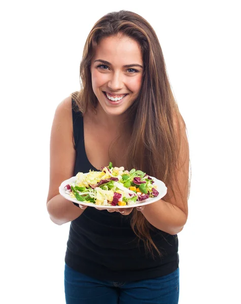 Frau hält köstlichen Salat in der Hand — Stockfoto