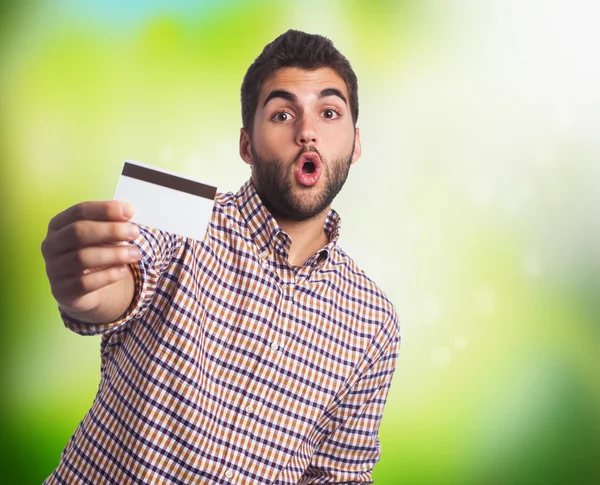 Man holding a credit card — Stock Photo, Image