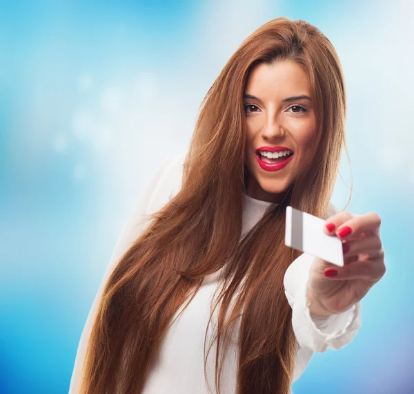 Woman giving a credit card — Stock Photo, Image