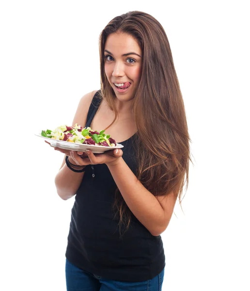 Frau hält köstlichen Salat in der Hand — Stockfoto