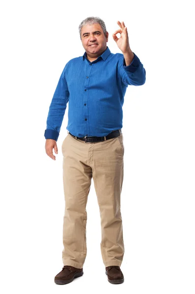 Man doing success gesture — Stock Photo, Image