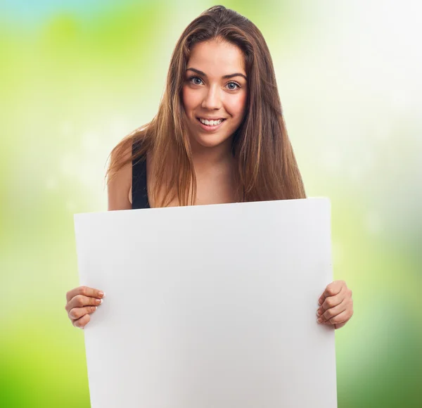 Girl holding a white banner — Stock Photo, Image