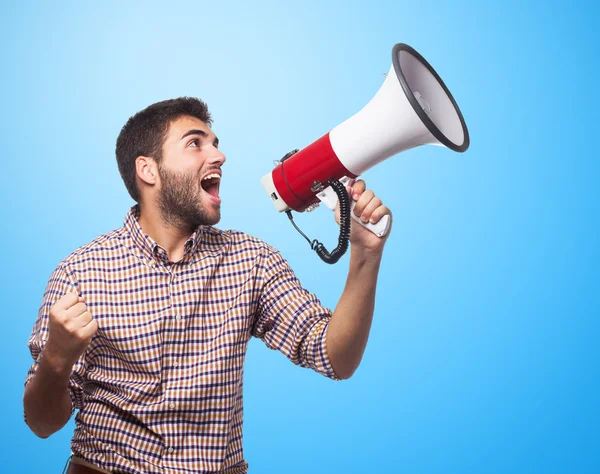 Mann brüllt mit Megafon — Stockfoto