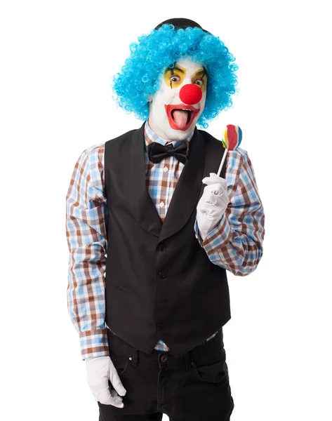 Clown holding a lollipop — Stock Photo, Image