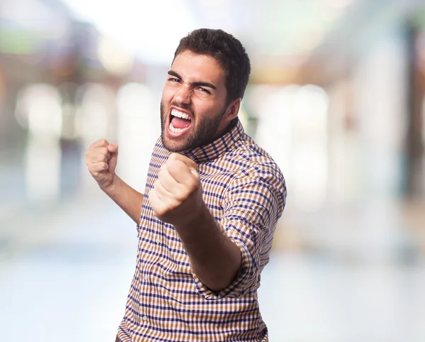 Man doing victory gesture