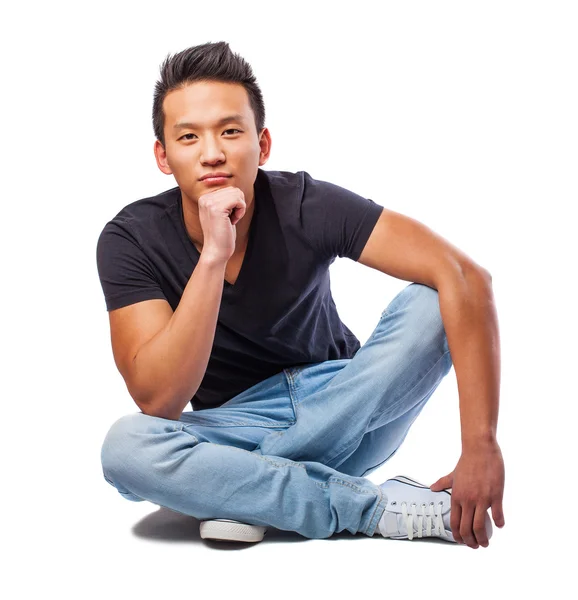 Asiatiska man sitter — Stockfoto