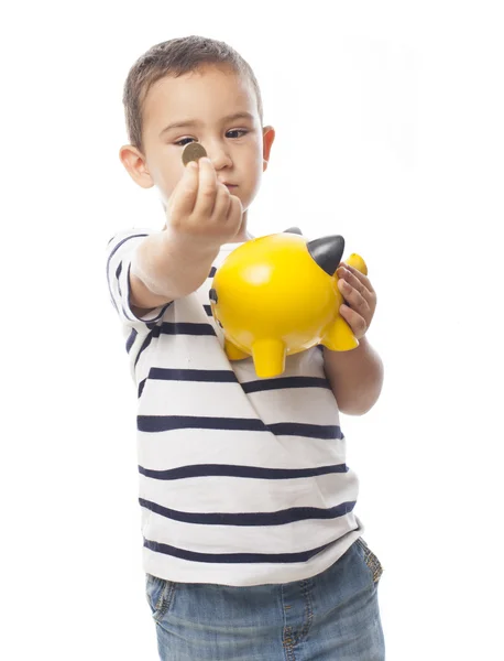 Chłopiec trzyma skarbonkę — Zdjęcie stockowe