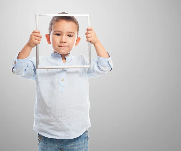 Niño con marco vacío —  Fotos de Stock