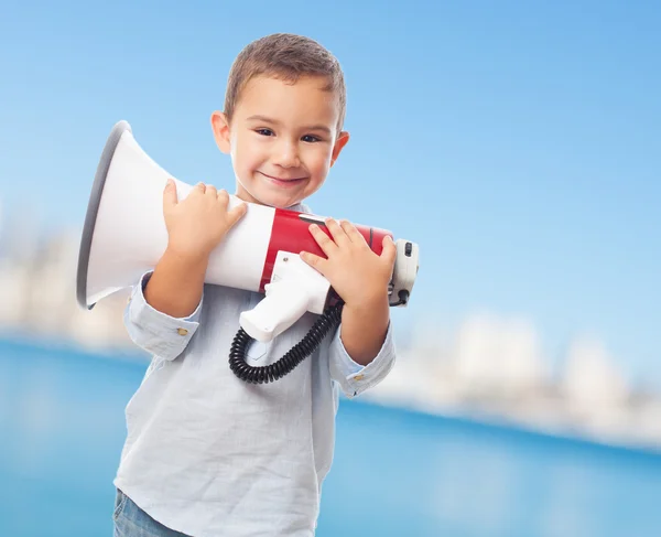 Rapaz segurando um megafone — Fotografia de Stock