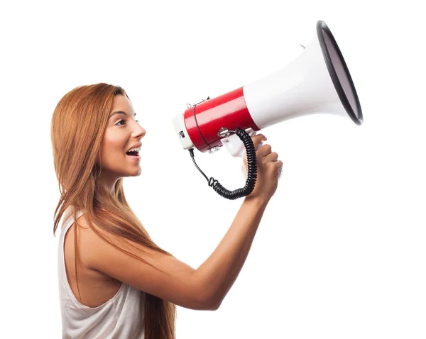 Mulher gritando através de megafone — Fotografia de Stock