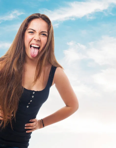 Girl showing her tongue — Stock Photo, Image