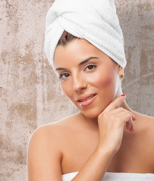 Young woman with a towel — Stock Photo, Image