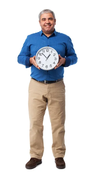 Man holding a clock — Stock Photo, Image