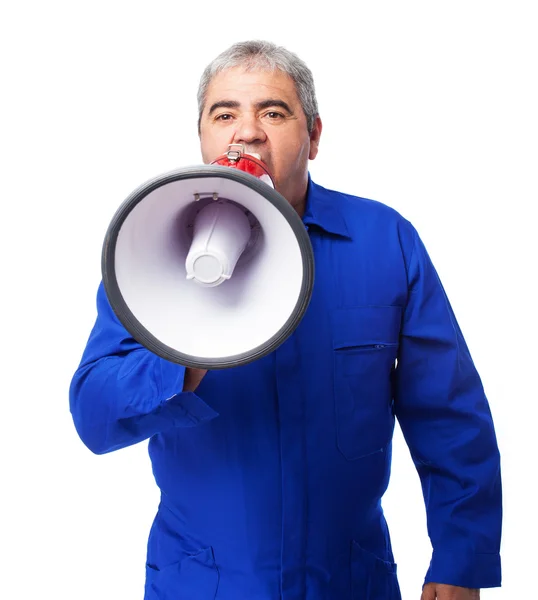 Mechanic shouting with a megaphone — Stock Photo, Image