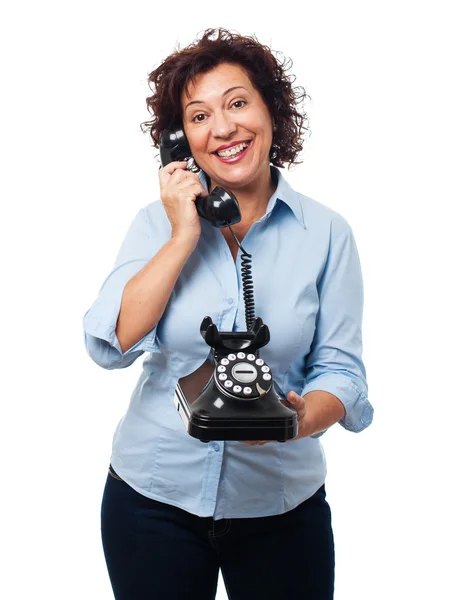 Mulher madura falando ao telefone — Fotografia de Stock