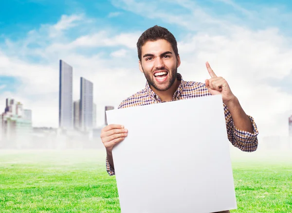 Hombre sosteniendo una pancarta —  Fotos de Stock