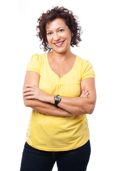 Woman standing with crossed arms — Stock Photo, Image