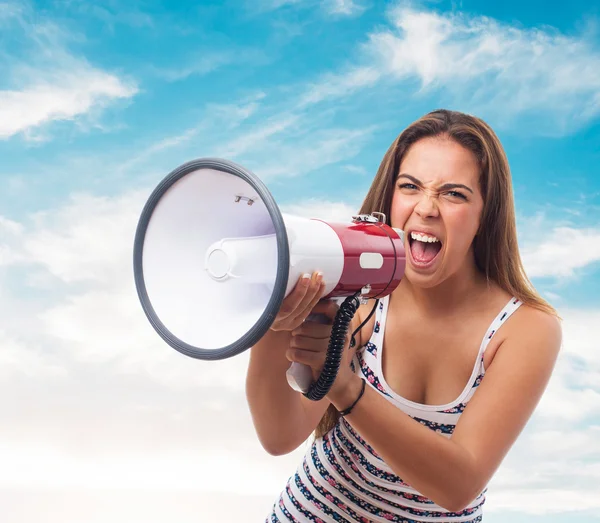 Woman shouting with a megaphone — Stock Photo, Image