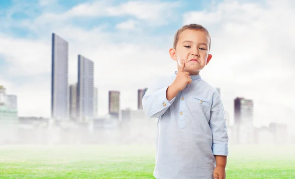 Little boy with pensive gesture — Stock Photo, Image