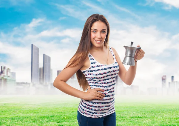 Girl holding a coffee pot — Stock Photo, Image