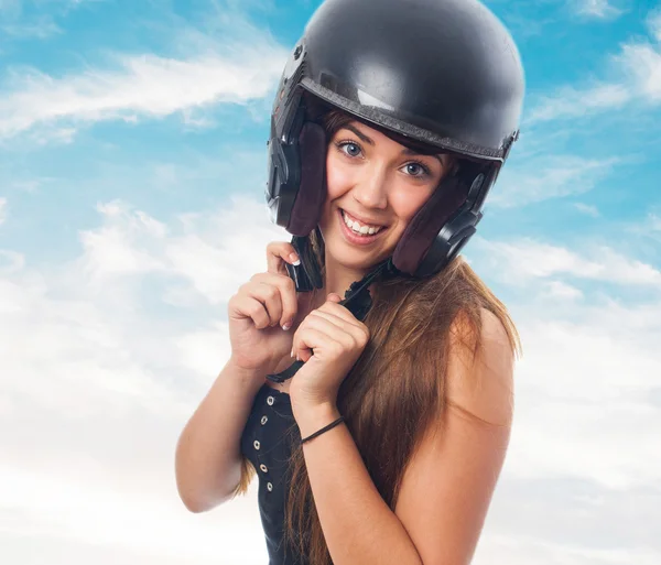 Young woman with a black helmet — Stock Photo, Image