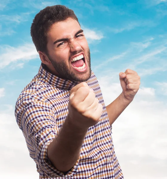 Man doing victory gesture