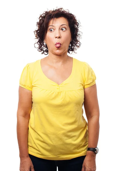 Mujer mostrando su lengua — Foto de Stock