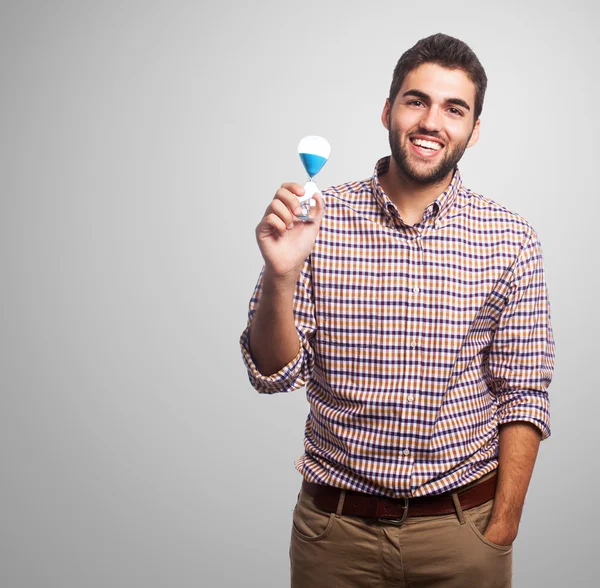 Man holding a sand timer — Stock Photo, Image