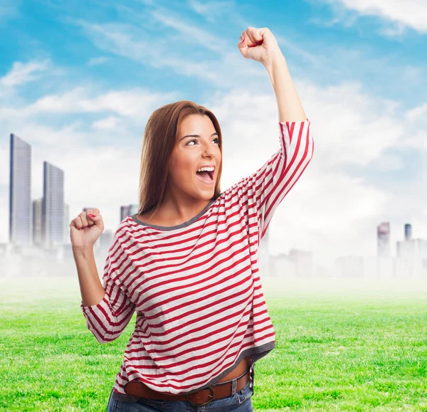Woman doing a winner gesture — Stock Photo, Image