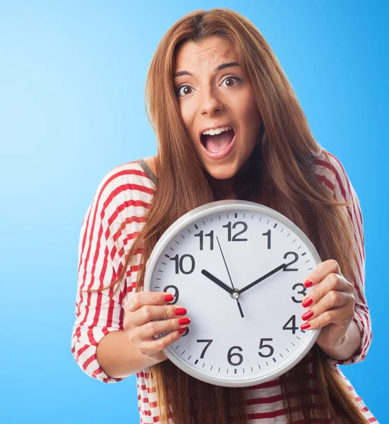Woman holding a big clock — Stock Photo, Image