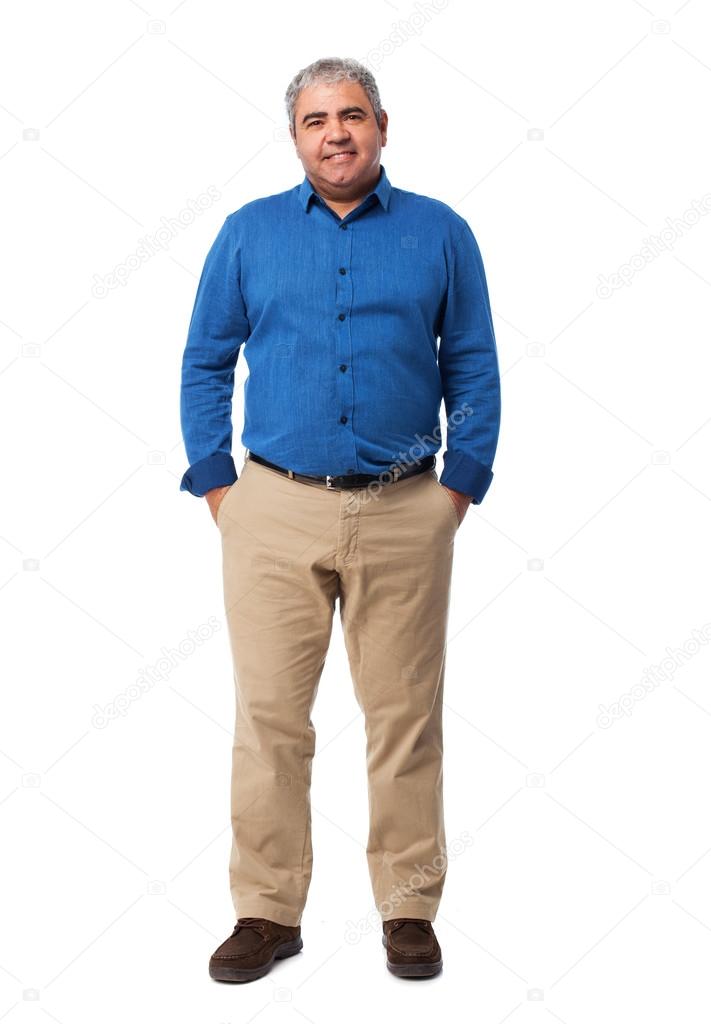 Man standing over white
